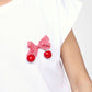 T-shirt con decorazioni a fiocco