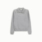 Pullover con colletto decorato