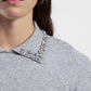 Pullover con colletto decorato