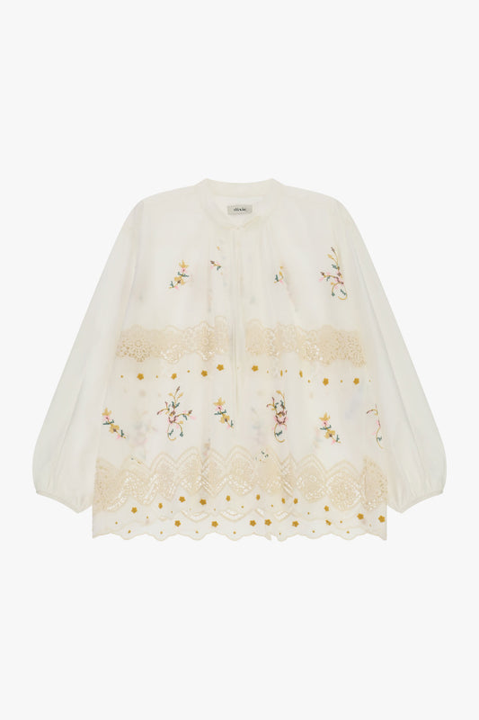 Blusa ampia ricamo floreale inserti pizzo