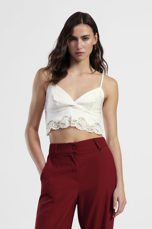 Top corto con scollo a v e bordo in pizzo