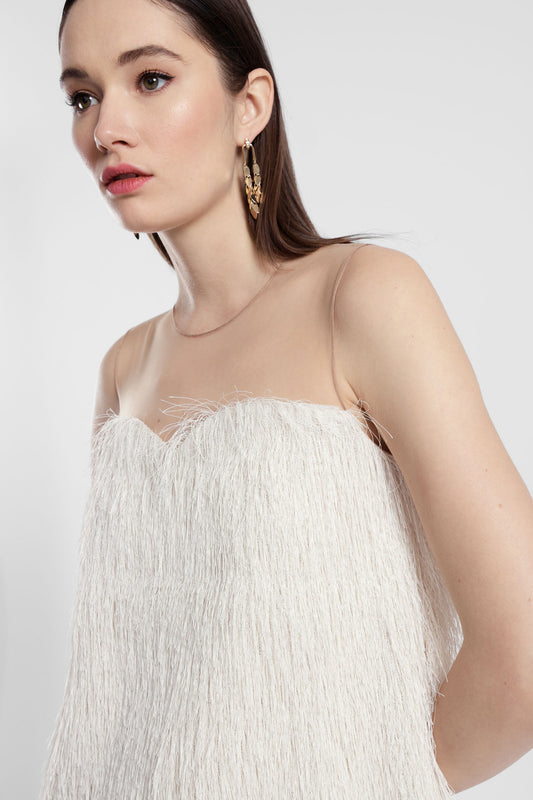 Abito corto con inserto trasparente e frange