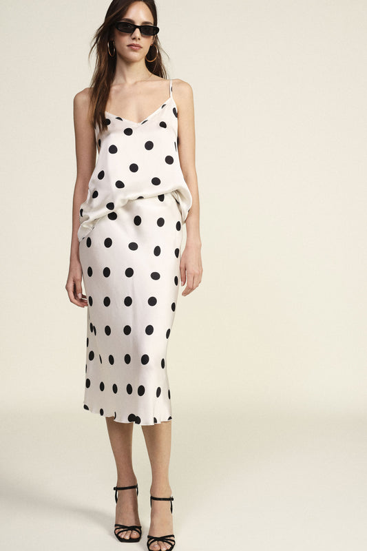 Gonna midi a pois con linea svasata