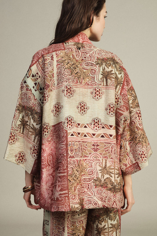 Duster coat a fantasia patchwork con manica ampia