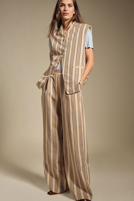 Pantaloni ampi a righe vita alta con tasche