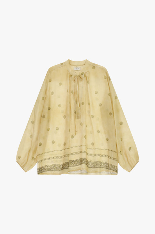 Blusa ampia con ricami geometrici e laccetto