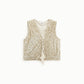 Gilet con paillettes e lacci