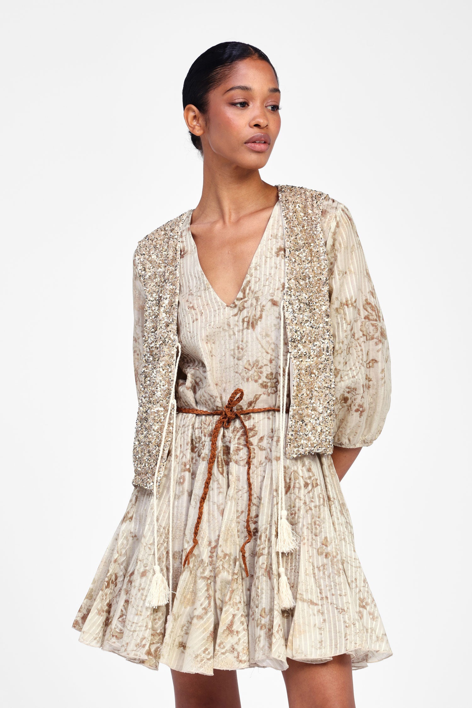 Gilet con paillettes e lacci
