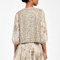 Gilet con paillettes e lacci