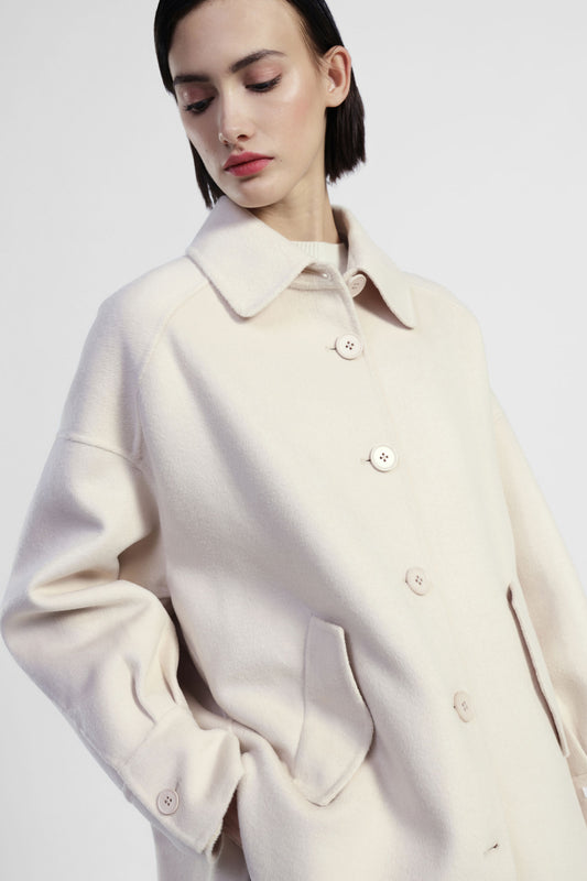 Cappotto oversize con tasche a filetto e bottoni