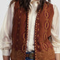Gilet fantasia geometrica con frange