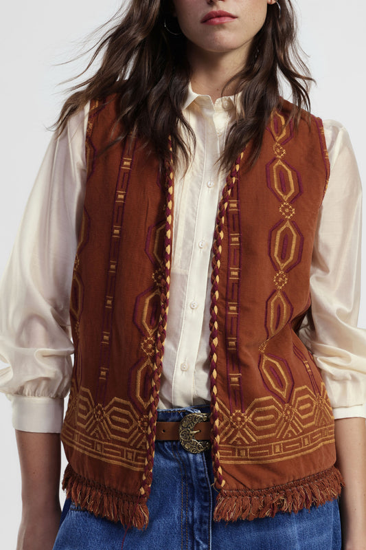 Gilet fantasia geometrica con frange