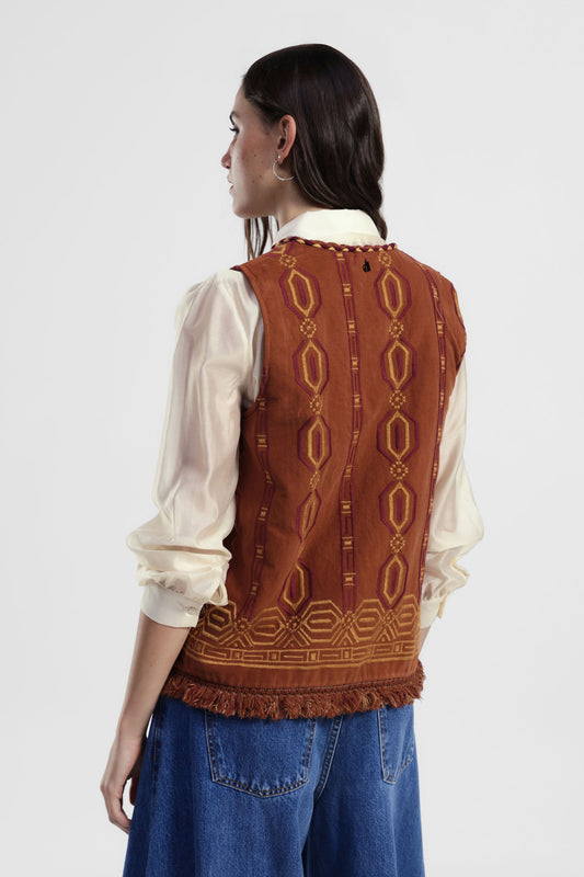 Gilet fantasia geometrica con frange