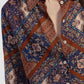 Camicia fantasia geometrica con bottoni frontali