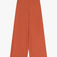 Pantaloni palazzo con piega centrale e tasche
