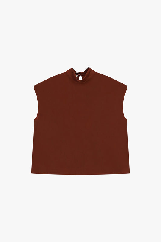 Blusa senza maniche con collo alto e chiusura a goccia