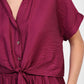 Camicia corta con nodo frontale