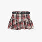 Gonna corta a quadri con cintura e balze
