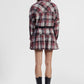 Gonna corta a quadri con cintura e balze