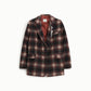 Blazer a quadri con spilla decorativa e tasche