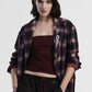 Blazer a quadri con spilla decorativa e tasche