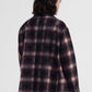 Blazer a quadri con spilla decorativa e tasche