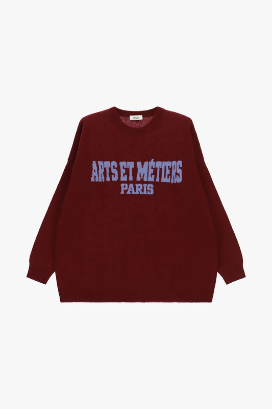 Maglione girocollo con scritta jacquard oversize