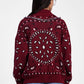 Cardigan con motivi e rifiniture