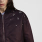 Bomber jacket con perle applicate e fondo arricciato