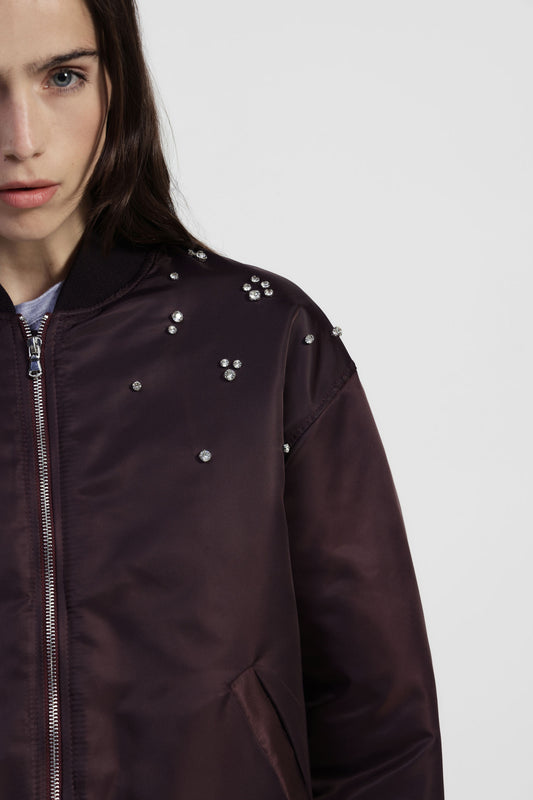 Bomber jacket con perle applicate e fondo arricciato