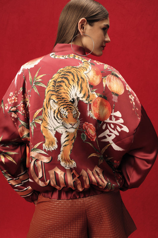 Bomber con stampa floreale e dettagli grafici