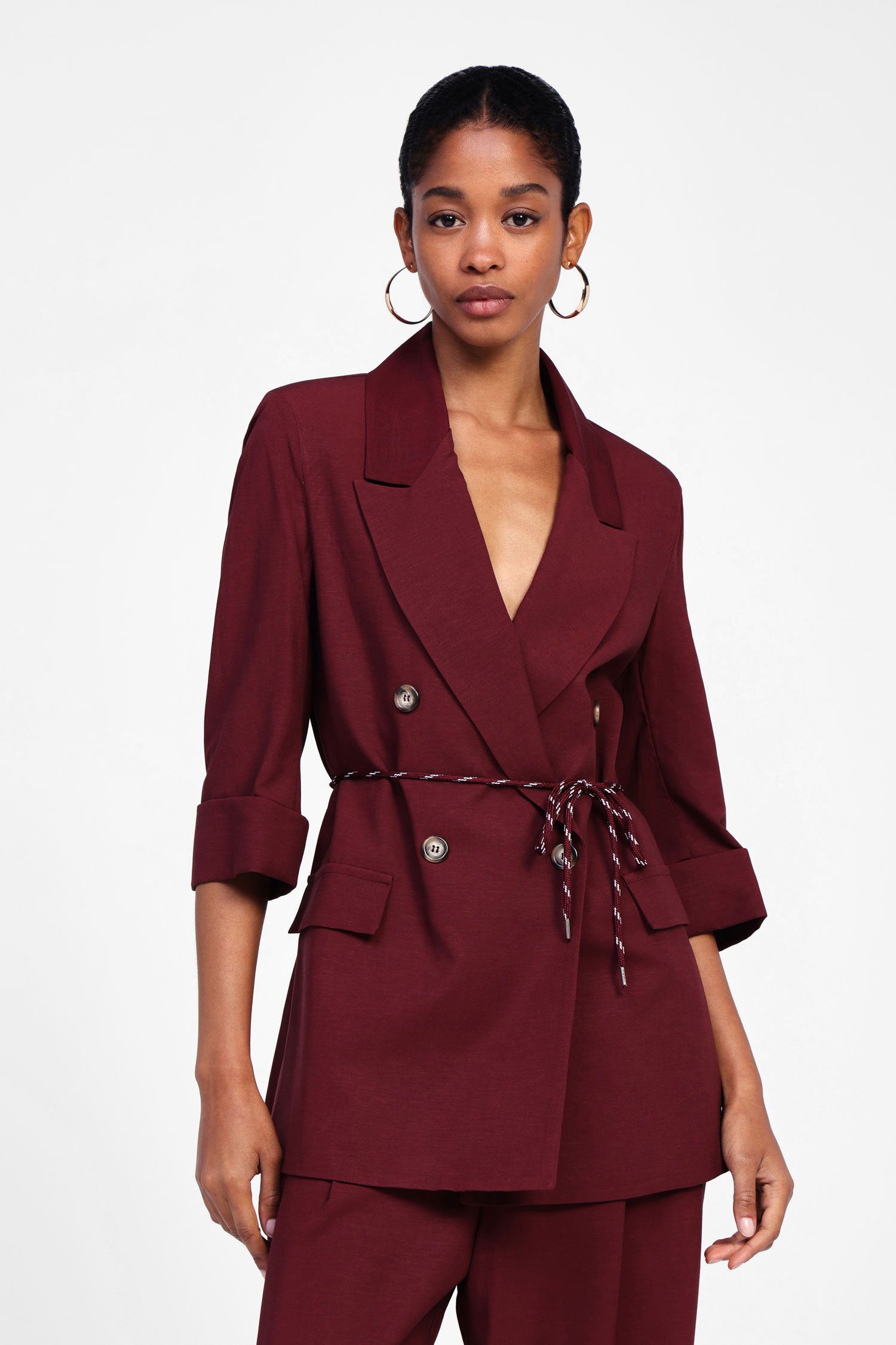 Blazer con bottoni doppi e cintura
