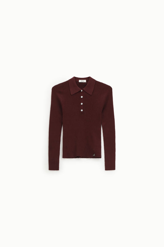 Maglione a coste con bottoni gioiello e polo