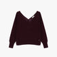 Maglione scollo a v con bottoni sul retro
