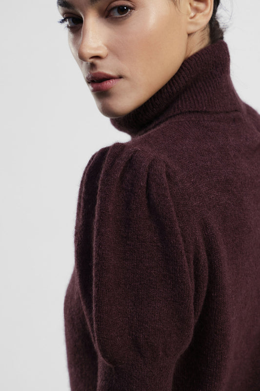 Maglione a collo alto maniche corte a palloncino