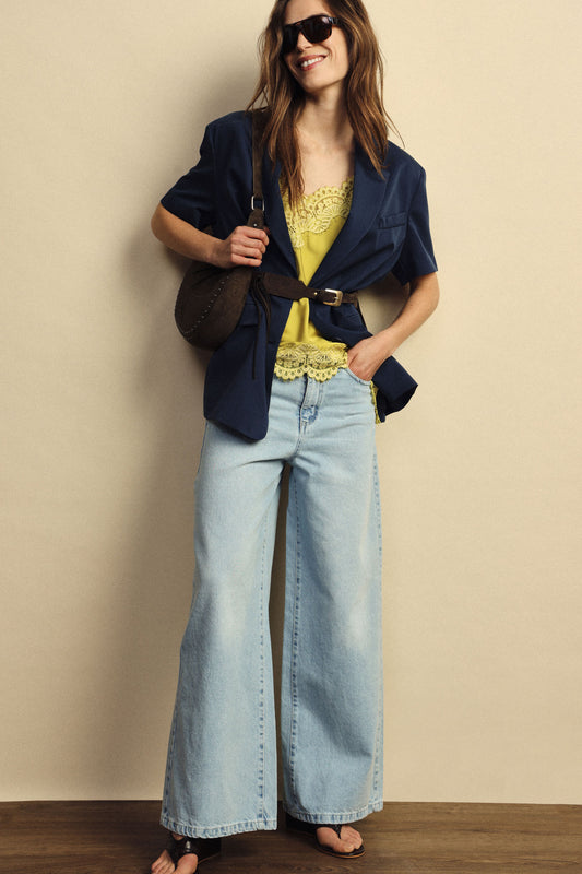 Blazer maniche corte con tasche a filetto