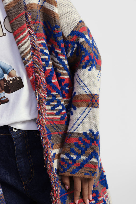 Cappotto con frange e motivo geometrico