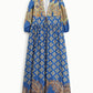 Abito lungo con stampa paisley e quadri