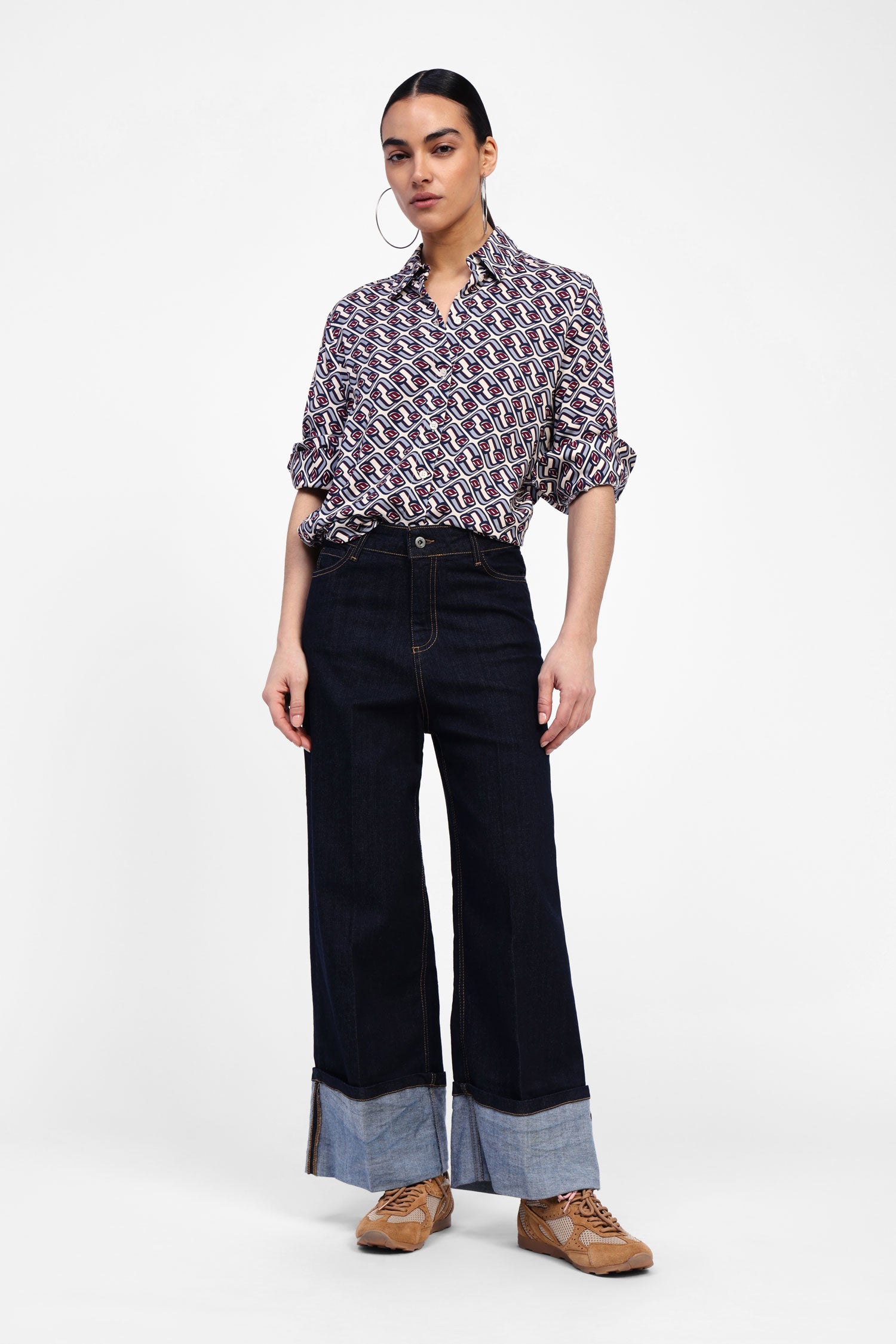 Jeans a gamba larga con risvolto