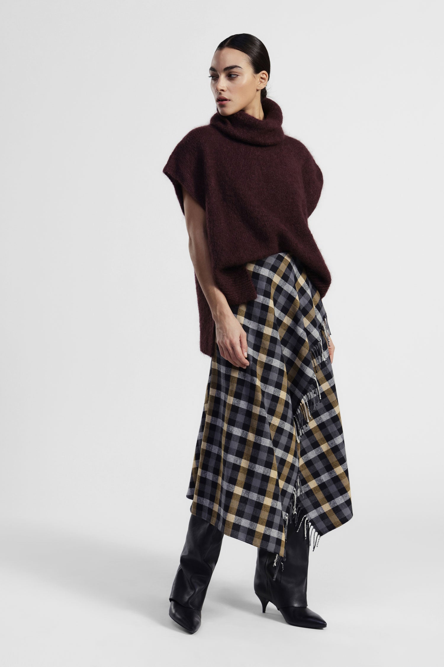 Gonna a quadri con frange e orlo asimmetrico