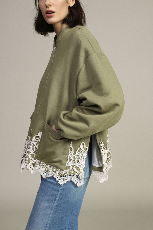 Felpa zip frontale con tasche e bordo pizzo