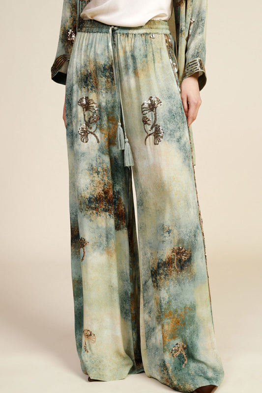 Pantaloni palazzo stampa astratta con dettagli ricamati