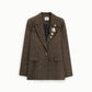 Blazer fantasia pied de poule con spille decorative