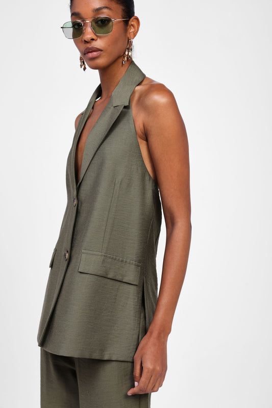 Gilet con spalle scoperte e tasche