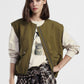 Gilet corto con tasche e zip frontale