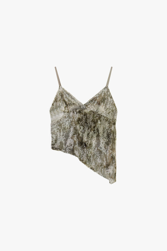 Top con paillettes e scollo asimmetrico