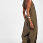 Jumpsuit con collo halter e taglio ampio
