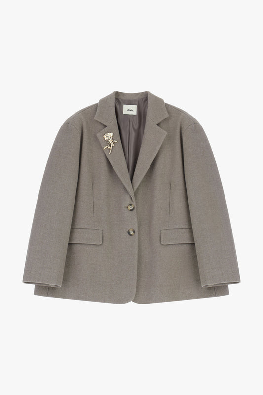 Blazer doppiopetto con spilla floreale decorativa