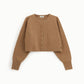 Cardigan con bottoni e maniche ampie