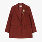 Blazer a righe con chiusura monopetto e spille